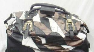 红海棠小羊皮拉杆箱 二手转让中的优雅出行伴侣